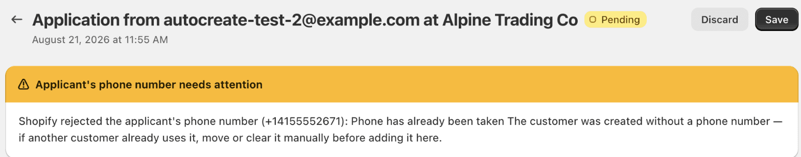 The warning banner shown on an application when the applicant's phone number was already in use